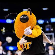 Georgia Tech Mascot Buzz, a Yellow Jaket, pointing to the viewer